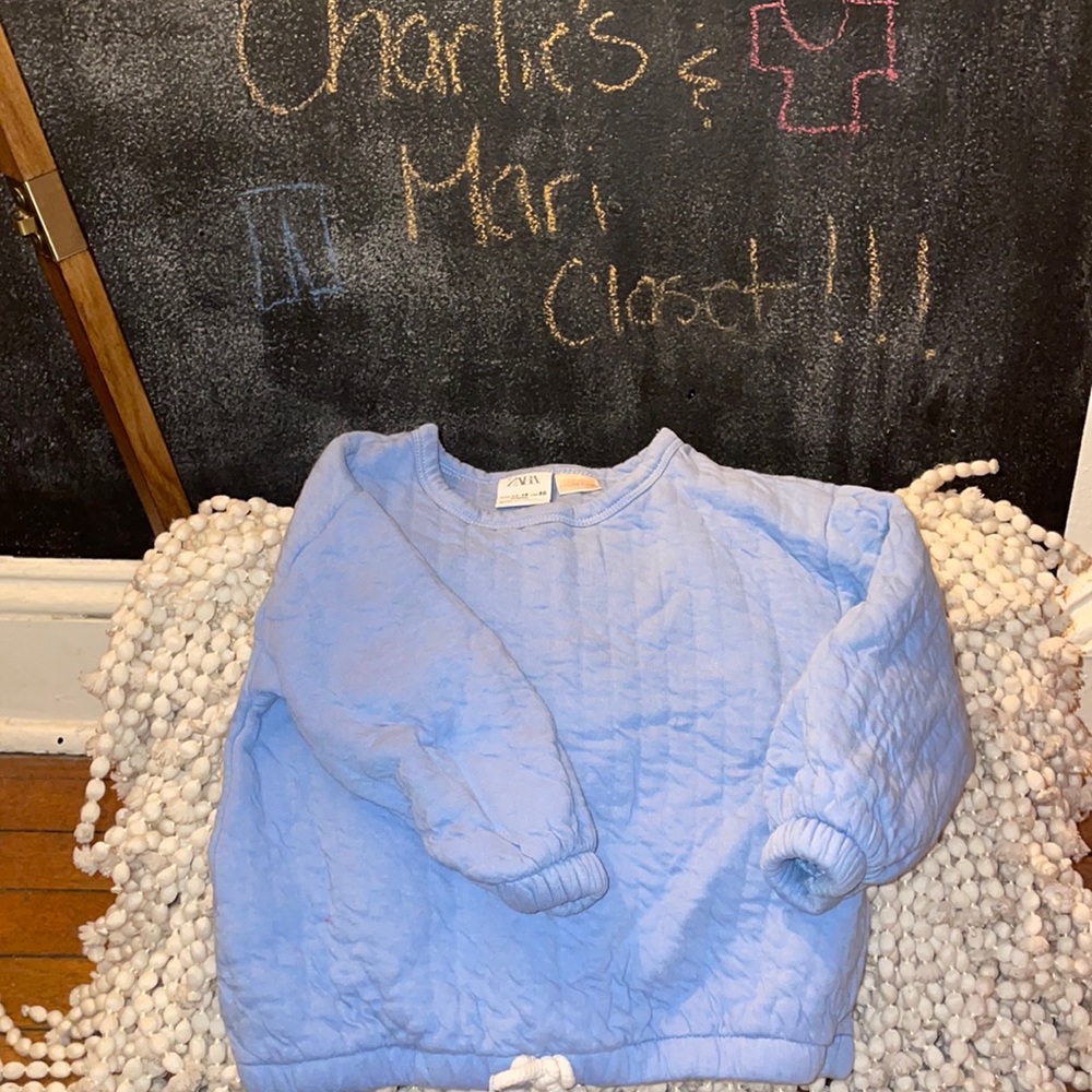 Baby blue tie sweater